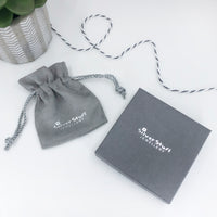 Sterling silver cupped heart initial necklace