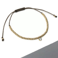 Diamond 14ct yellow gold beaded adjustable corded friendship bracelet