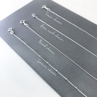 Sterling silver crystal birthstone initial heart charm necklace