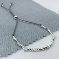 Sterling silver adjustable beaded moon & stars friendship bracelet