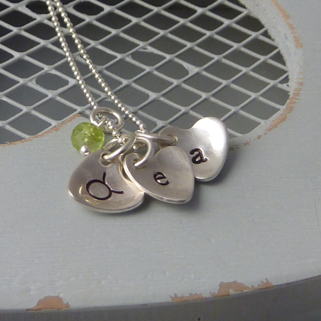 Sterling silver cupped heart initial necklace