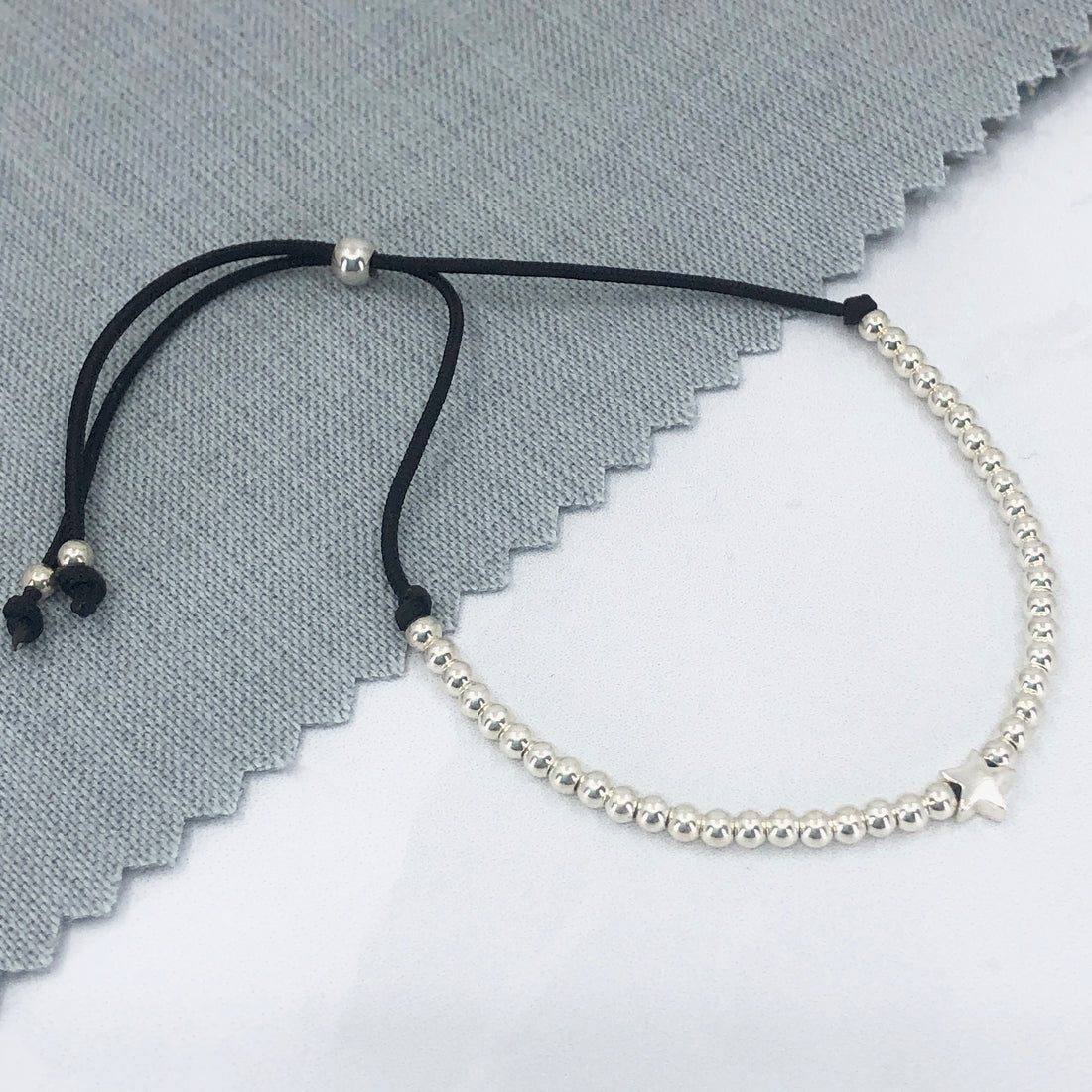 Sterling silver adjustable beaded star friendship bracelet